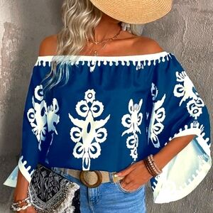 Elegent off the shoulder, ladies' blouse. Geometric pattern.